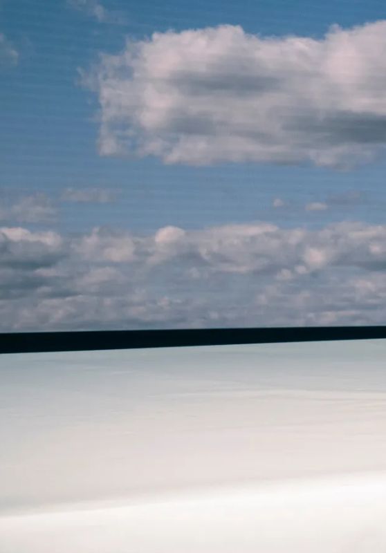 Du Juan: Ethereal Beauty Captured in Dreamy Cloudscape