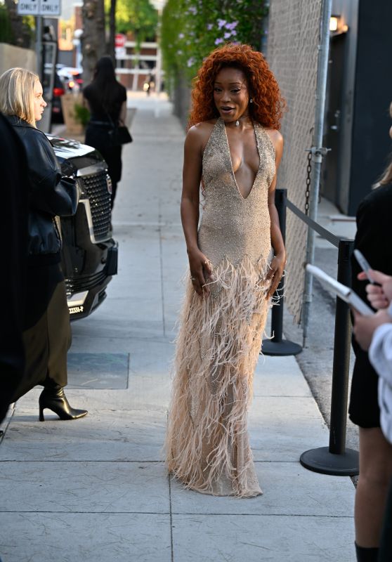 Keke Palmer Shimmers in Feathered Gown at Exclusive Event