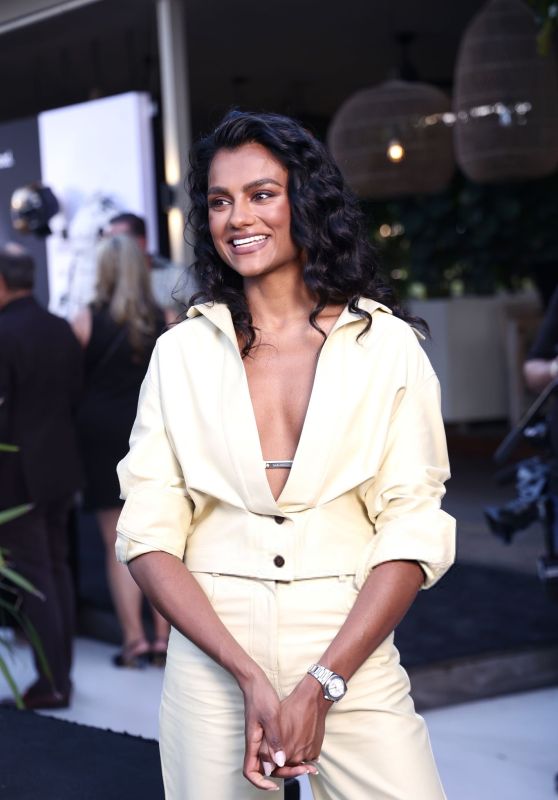 Simone Ashley Shines in Chic Cream Ensemble at IWC Miami Event